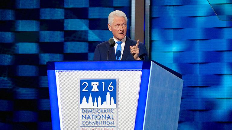 Former President Bill Clinton speaks on July 26 at the 2016 Democratic National Convention. Clinton recounted the story of meeting his wife, Democratic presidential nominee Hillary Clinton, and exalted her as a "change maker." (Evan Garcia / Chicago Tonight)