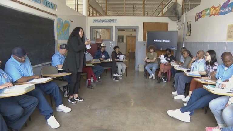 The nonprofit Prison + Neighborhood Arts/Education Project conducts a class at Stateville Correctional Center. (WTTW News)