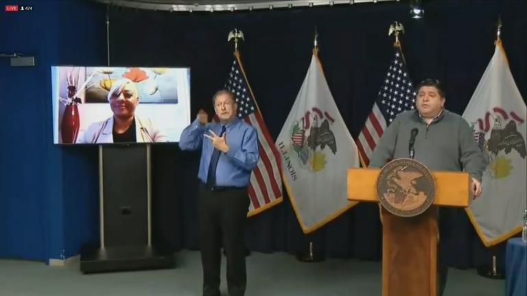 Gov. J.B. Pritzker introduces Steger resident Shanna Siegers during his COVID-19 briefing Tuesday, Dec. 1, 2020. (WTTW News)