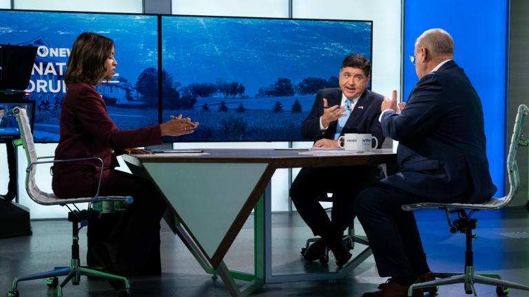 Brandis Friedman, left, moderates a WTTW News forum with candidates for Illinois governor JB Pritzker, center, and Darren Bailey on Oct. 13, 2026. (Ken Carl for WTTW)  