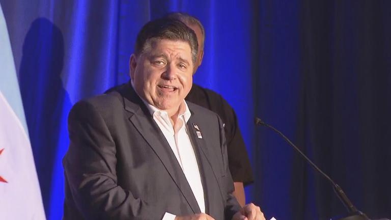 Gov. J.B. Pritzker speaks to a gathering of the Illinois delegation at the DNC on Aug. 19, 2024. (WTTW News)