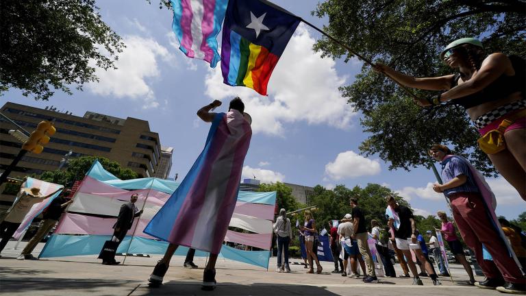 FILE - In this Thursday, May 20, 2021 file photo, demonstrators gather on the steps to the State Capitol to speak against transgender-related legislation bills being considered in the Texas Senate and Texas House in Austin, Texas. (AP Photo / Eric Gay, File)