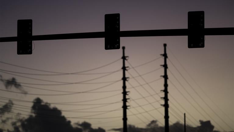 raffic lights are out of service on a street in San Juan, Puerto Rico, early Thursday, April 7, 2022. (AP Photo / Carlos Giusti)