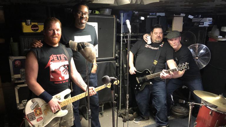 The Bollweevils pose after a rehearsal in a Northwest Side basement. From left: Pete Mittler, Daryl Wilson, Ken Fitzner, Pete Mumford. (Jay Shefsky / Chicago Tonight) The Bollweevils pose after a rehearsal in a Northwest Side basement. From left: Pete Mittler, Daryl Wilson, Ken Fitzner, Pete Mumford. (Jay Shefsky / Chicago Tonight)