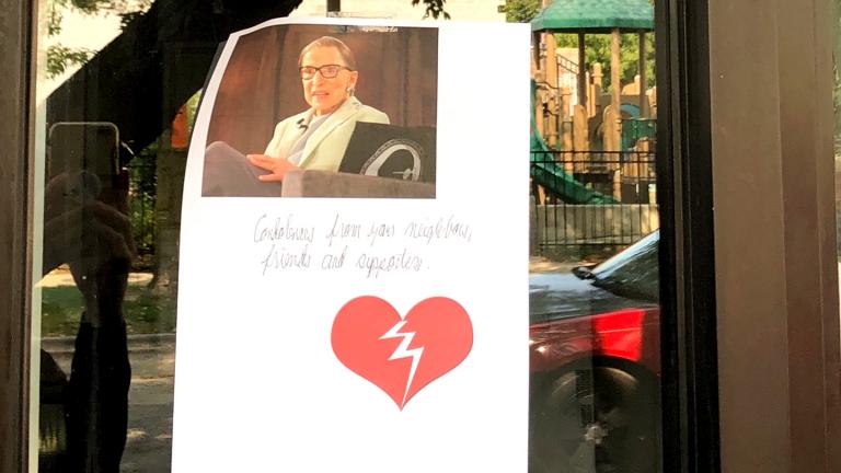 A small memorial for Ruth Bader Ginsburg, outside the Edgewater offices of Cedille Records, owned by the son of the late Supreme Court justice. (Patty Wetli / WTTW News)