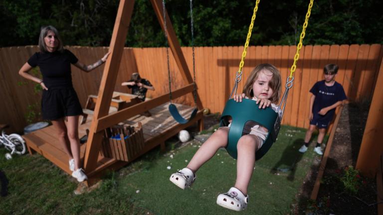 Eileen Lamb, from left, who was diagnosed with autism as an adult, watches over her children, Charlie Lamb and Jude, right, who also have autism, and daughter Billie, Monday, May 12, 2025, in Austin, Texas. (AP Photo / Eric Gay)