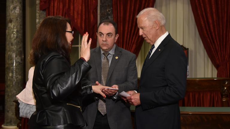 Tammy Duckworth (left) is sworn in as senator Tuesday. 