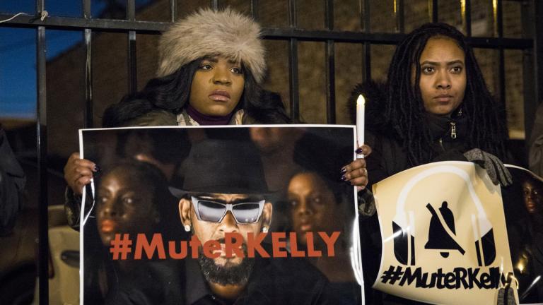 #MuteRKelly supporters protest outside R. Kelly’s studio, Wednesday, Jan. 9, 2019, in Chicago. (Ashlee Rezin / Chicago Sun-Times via AP, File)