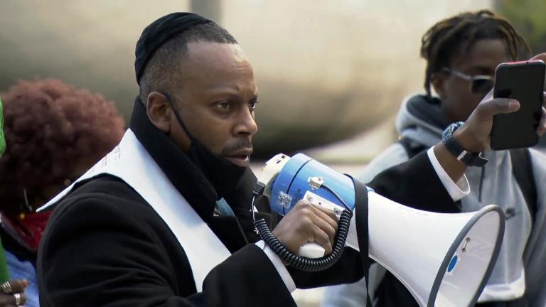 Rabbi Michael Ben Yosef of the Chicago Activist Coalition For Justice speaks during a demonstration in Millennium Park on Thursday, April 15, 2021. (WTTW News)