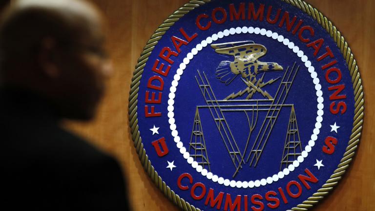 This Dec. 14, 2017, file photo, shows the seal of the Federal Communications Commission (FCC) before a meeting in Washington. (AP Photo / Jacquelyn Martin, File)