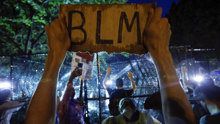 In this June 4, 2020, file photo, demonstrators protest near the White House in Washington, over the death of George Floyd, a black man who was in police custody in Minneapolis. (AP Photo / Alex Brandon, File)