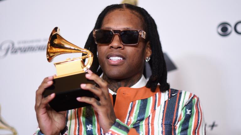 FILE - Lil Durk poses in the press room with the award for best melodic rap performance for “All My Life” by Lil Durk featuring J. Cole during the 66th annual Grammy Awards, Feb. 4, 2024, in Los Angeles. (Richard Shotwell / Invision / AP, File)
