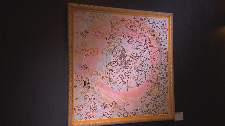 A painting by Raspy Rivera on display. (WTTW News)