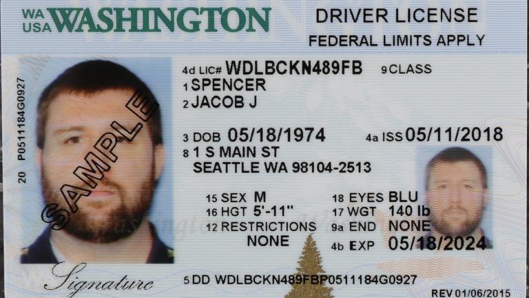 In this June 22, 2018, file photo, a sample copy of a Washington driver’s license is shown at the Washington state Department of Licensing office in Lacey, Wash. (AP Photo / Ted S. Warren, File)