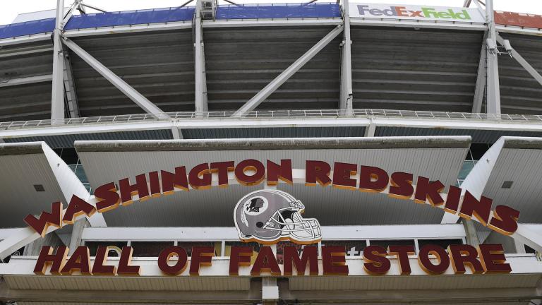 Signs for the Washington Redskins are displayed outside FedEx Field in Landover, Md., Monday, July 13, 2020. (AP Photo / Susan Walsh)