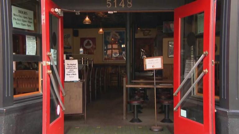 Restaurant and bar restrictions aimed at curbing the spread of COVID-19 have resulted in empty tables across Illinois and some temporary closures, including at Andersonville pub Hopleaf. (WTTW News) Restaurant and bar restrictions aimed at curbing the spread of COVID-19 have resulted in empty tables across Illinois and some temporary closures, including at Andersonville pub Hopleaf. (WTTW News)