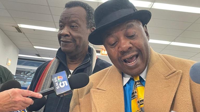 As mayoral candidate Willie Wilson looks on, former state Sen. Rickey Hendon tells reporters why he challenged Ja'Mal Green's nominating petitions. (Heather Cherone / WTTW News)