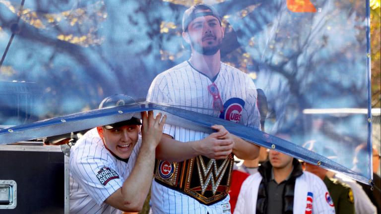 Cubs players Anthony Rizzo and Kris Bryant joke with the crowd before the team is introduced at the World Series rally in Grant Park. (Evan Garcia / Chicago Tonight)