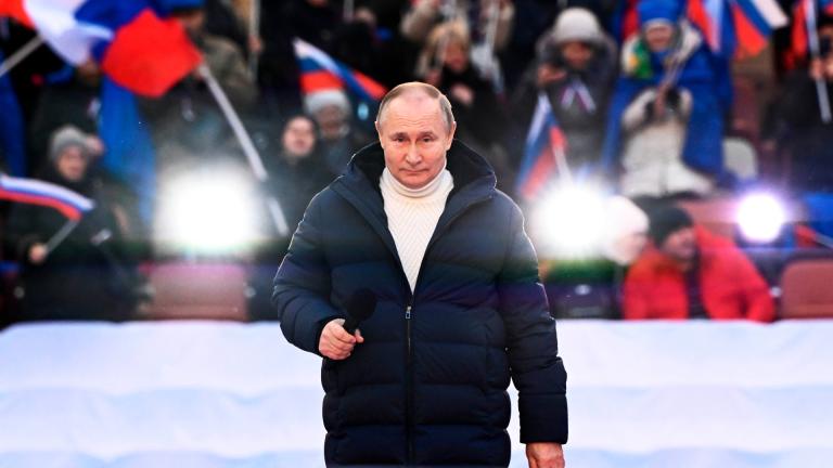 Russian President Vladimir Putin delivers his speech at the concert marking the eighth anniversary of the referendum on the state status of Crimea and Sevastopol and its reunification with Russia, in Moscow, Russia, Friday, March 18, 2022. (Sergei Guneyev / Sputnik Pool Photo via AP)
