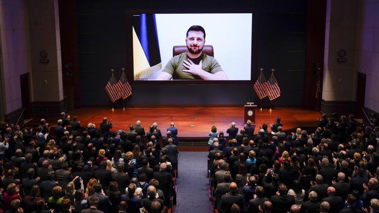 Ukrainian President Volodymyr Zelenskyy speaks to the U.S. Congress by video to plead for support as his country is besieged by Russian forces, at the Capitol in Washington, Wednesday, March 16, 2022. (AP Photo / J. Scott Applewhite, Pool)