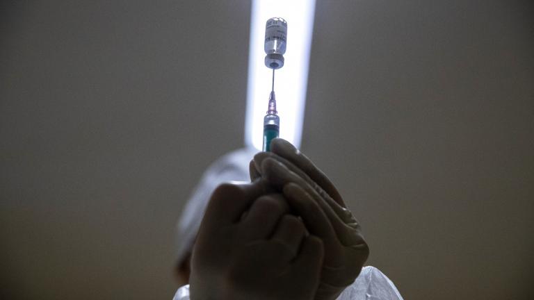 In this Wednesday, Dec. 30, 2020 file photo, a medical worker prepares a shot of Russia's Sputnik V coronavirus vaccine in Moscow, Russia. (AP Photo / Pavel Golovkin, File)