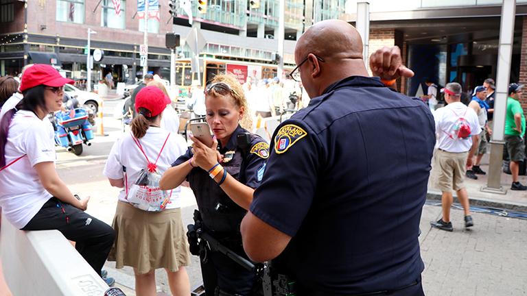 Cleveland police officers outside of the Quicken Loans Arena. (Evan Garcia)