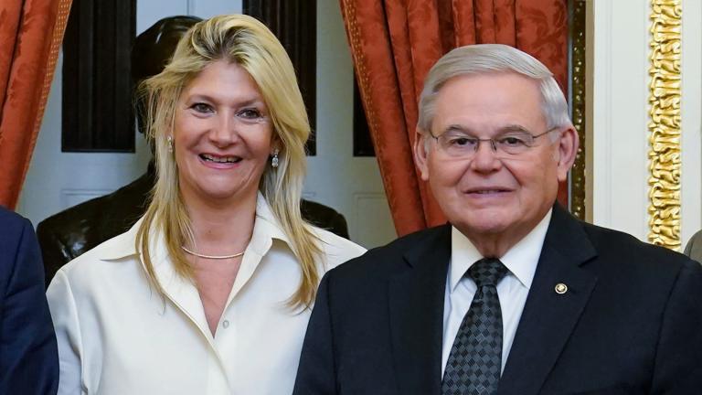 Senate Foreign Relations Committee Chairman, Sen. Bob Menendez, D-N.J., right, and his wife Nadine Arslanian, pose for a photo on Capitol Hill in Washington, Dec. 20, 2022. (AP Photo  /Susan Walsh, File)