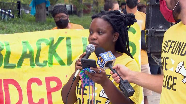 Adwoa Agyepong of the Chicago Democratic Socialists of America speaks at a rally to end the city’s use of ShotSpotter technology on Thursday, Aug. 19, 2021. (WTTW News)