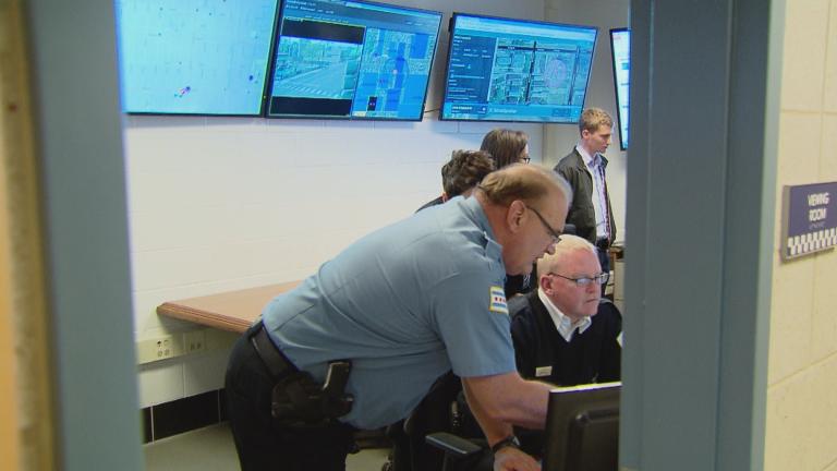 Chicago police officers use ShotSpotter technology. (WTTW News)