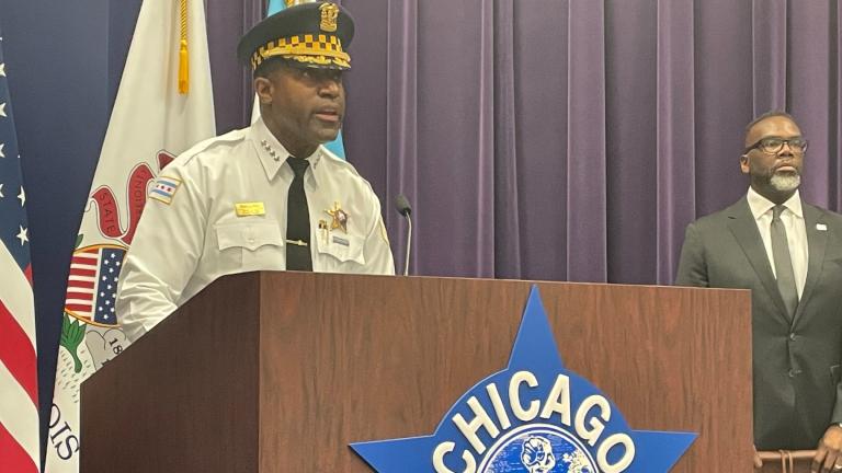 Chicago Police Supt. Larry Snelling addresses the news media on Friday, April 12, 2024, as Mayor Brandon Johnson looks on. (Heather Cherone / WTTW News)