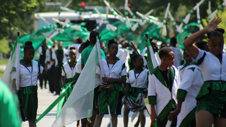 The South Shore Drill Team performs at the 2015 Englewood Back to School Parade. (Courtesy of Nicole Vaughn)