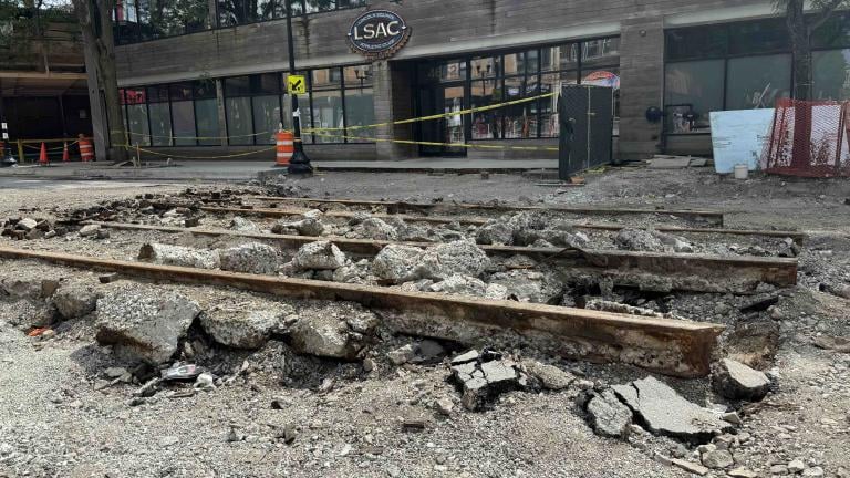 Exposed streetcar rails are a blast from Chicago's transit past. Seen in the 4600 block of North Lincoln Avenue in the Lincoln Square neighborhood. (Patty Wetli / WTTW News)
