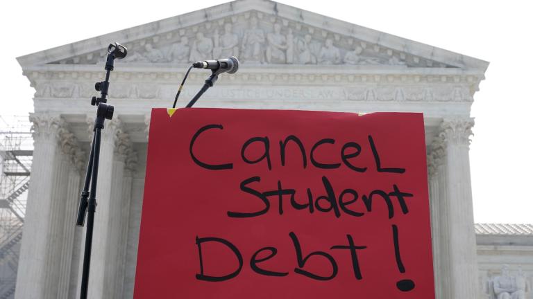 A sign reading “cancel student debt” is seen outside the Supreme Court, Friday, June 30, 2023 in Washington. (AP Photo / Mariam Zuhaib)