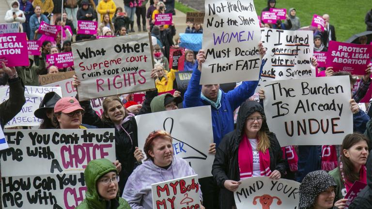  Protesters gather at the steps of the Michigan State Capitol building in Lansing, Mich., Tuesday, May 3, 2022, during a rally organized by Planned Parenthood Michigan in response to the news that the U.S. Supreme Court could be poised to overturn the landmark Roe v. Wade case that legalized abortion nationwide. (Daniel Shular / The Grand Rapids Press via AP, File)