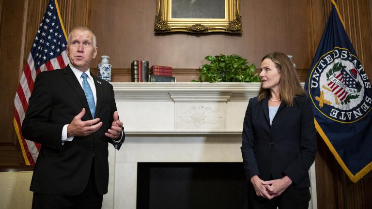 Sen. Thom Tillis, R-N.C., meets with Judge Amy Coney Barrett, President Donald Trump's nominee to the Supreme Court at the U.S. Capitol Wednesday, Sept. 30, 2020, in Washington. (Bill Clark / Pool via AP)