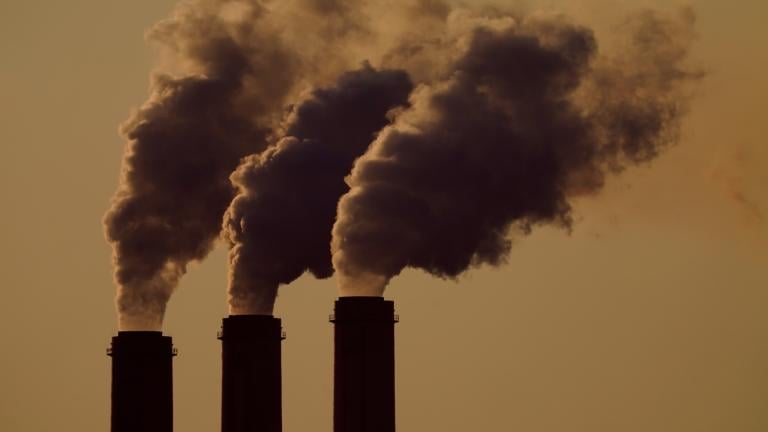 FILE - Emissions rise from smokestacks at the Jeffrey Energy Center coal power plant, near Emmett, Kan., Sept. 18, 2021. (Charlie Riedel / AP Photo, File)