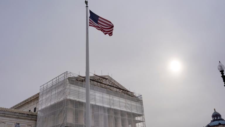 With the Supreme Court Building under renovations, the justices hear oral arguments on President Donald Trump's push to expand control over independent federal agencies, on Capitol Hill in Washington, Monday, Dec. 8, 2025. (AP Photo / J. Scott Applewhite)