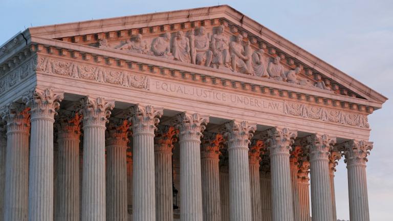 FILE - The setting sun illuminates the Supreme Court building on Capitol Hill in Washington, Jan. 10, 2023. (AP Photo / Patrick Semansky, File)