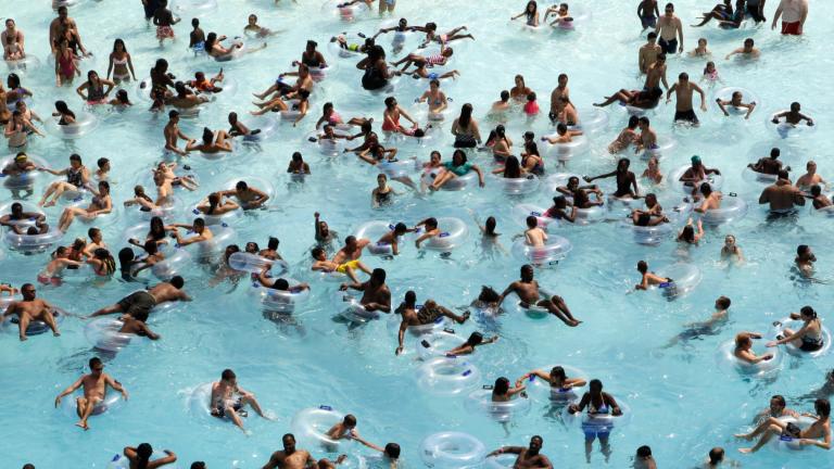 FILE - Swimmers try to stay cool in near 100-degree temperatures at Red Oaks Waterpark in Madison Heights, Mich., June 28, 2012. (Paul Sancya / AP Photo, File)