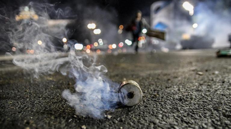 Tear gas cannot be used in combat, according to an international chemical weapons treaty, but it is not prohibited as a “riot control agent.” (Bobislav / iStock)