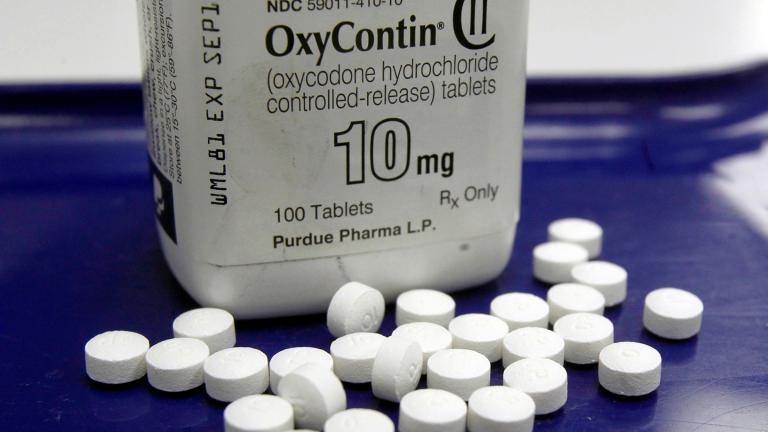 FILE - OxyContin pills are arranged for a photo at a pharmacy in Montpelier, Vt., Feb. 19, 2013. (AP Photo / Toby Talbot, File)