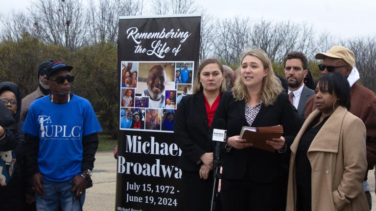 Attorneys and family gather outside Stateville Correctional Center on Nov. 14, 2024, to announce the filing of a wrongful death lawsuit over the death of Michael Broadway. He died in June while in custody of the Illinois Department of Corrections. (Blair Paddock / WTTW News)
