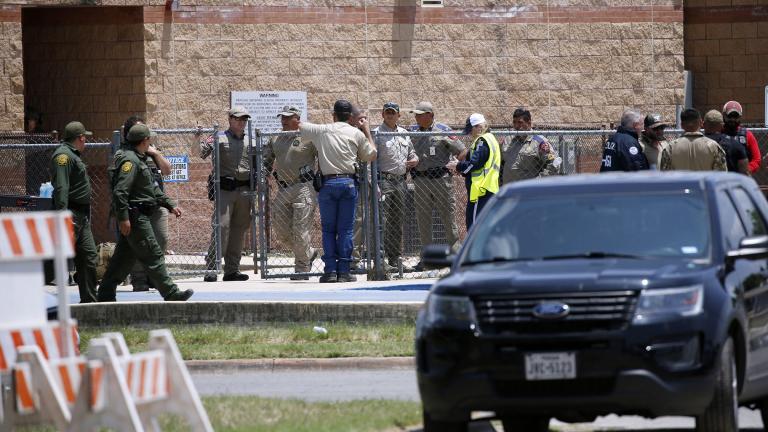 Law enforcement, and other first responders, gather outside Robb Elementary School following a shooting, on May 24, 2022, in Uvalde, Texas. (AP Photo / Dario Lopez-Mills, File)