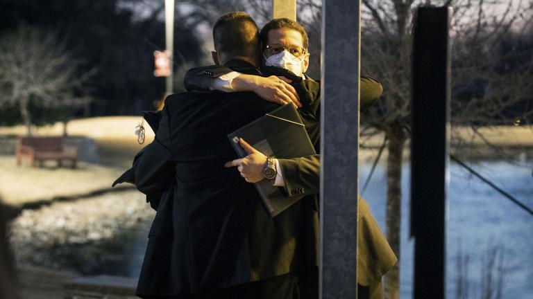 Congregation Beth Israel Rabbi Charlie Cytron-Walker, facing camera, hugs a man after a healing service Monday night, Jan. 17, 2022, at White’s Chapel United Methodist Church in Southlake, Texas. Cytron-Walker was one of four people held hostage by a gunman at his Colleyville, Texas, synagogue on Saturday. (Yffy Yossifor / Star-Telegram via AP)