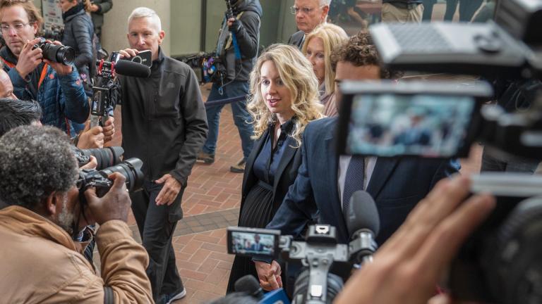 Theranos founder and CEO Elizabeth Holmes walks into federal court in San Jose, Calif., Friday, Nov. 18, 2022. (AP Photo / Nic Coury)