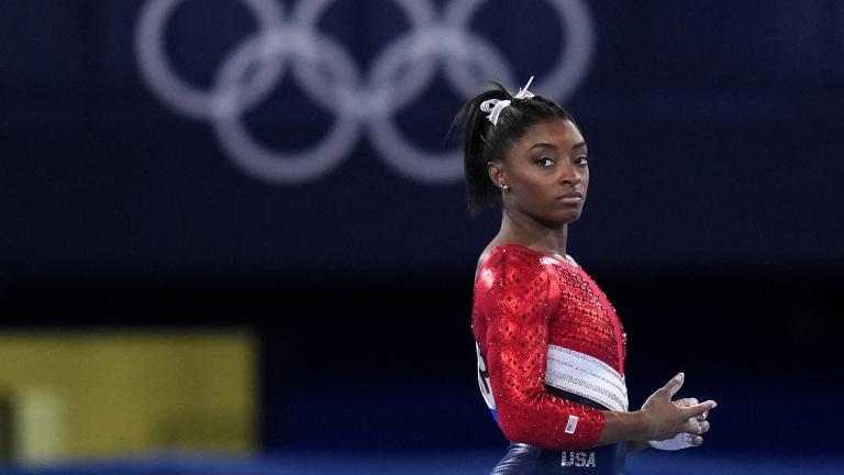 Simone Biles, of the United States, waits to perform on the vault during the artistic gymnastics women’s final at the 2020 Summer Olympics, Tuesday, July 27, 2021, in Tokyo. The American gymnastics superstar has withdrawn the all-around competition to focus on her mental well-being. (AP Photo / Gregory Bull)
