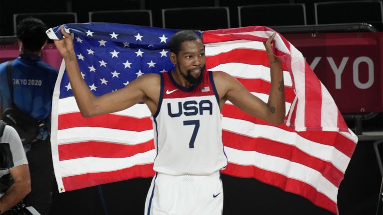 United States' Kevin Durant (7) celebrates after their win in the men's basketball gold medal game against France at the 2020 Summer Olympics, Saturday, Aug. 7, 2021, in Saitama, Japan. (AP Photo / Luca Bruno)
