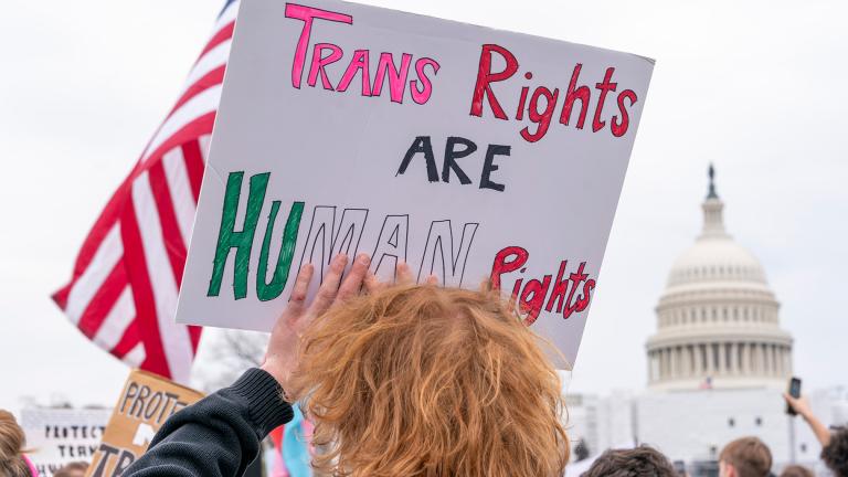 FILE - People attend a rally as part of a Transgender Day of Visibility, Friday, March 31, 2023, by the Capitol in Washington. (Jacquelyn Martin / AP Photo, File)