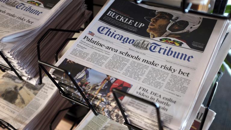 In this Monday, April 25, 2016, file photo, Chicago Tribune and other newspapers are displayed at Chicago’s O’Hare International Airport. (AP Photo / Kiichiro Sato, File)