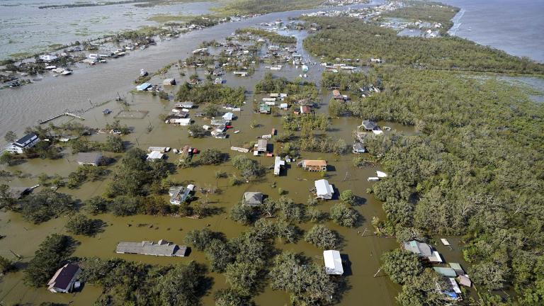 Homes are flooded in the aftermath of Hurricane Ida, Monday, Aug. 30, 2021, in Lafitte, La. The weather died down shortly before dawn. (AP Photo / David J. Phillip)